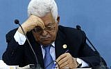 Palestinian Authority President Mahmoud Abbas takes notes during a meeting with journalists in the West Bank town of Ramallah on June 23, 2019. (ABBAS MOMANI / AFP)