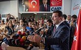 Ekrem Imamoglu, candidate of the secular opposition Republican People's Party (CHP), makes his victory statement at CHP offices in Istanbul, on June 23, 2019. (Bulent Kilic / AFP)