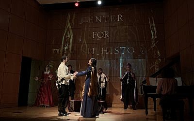 David Serero, center, plays Romeo and Ashley Brooke Miller plays Juliet in a Jewish adaptation of the classic tragedy. (Josefin Dolsten via JTA)