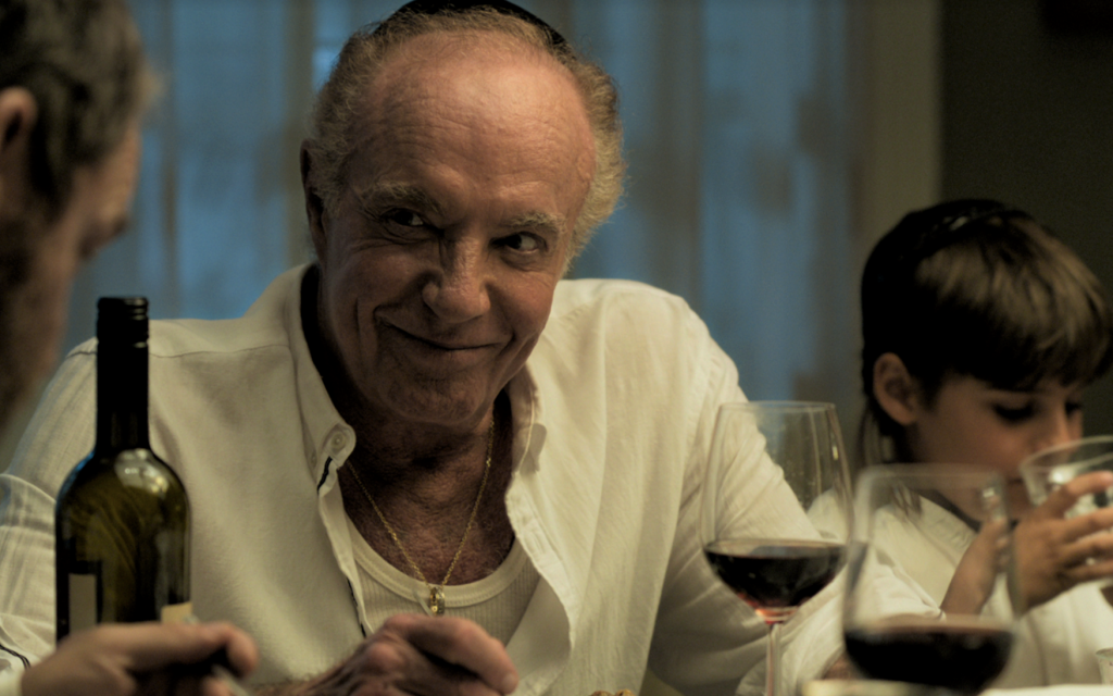 In “Holy Lands,” James Caan plays a secular American Jew who moves to Israel to escape the drama of his family — and to raise pigs. (Cinedigm/via JTA) In “Holy Lands,” James Caan plays a secular American Jew who moves to Israel to escape the drama of his family — and to raise pigs. (Cinedigm/via JTA)