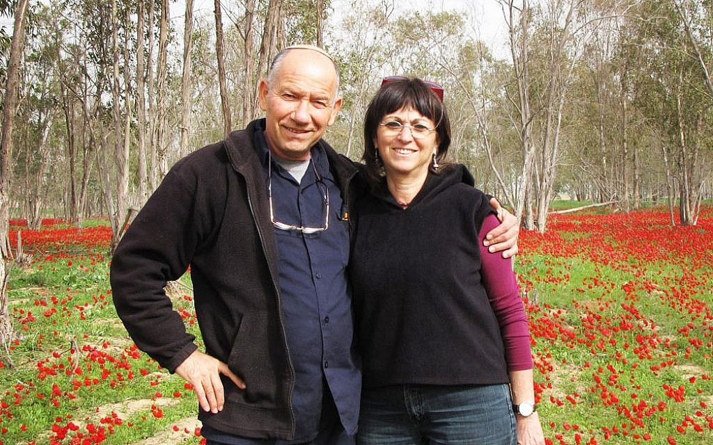 Yoskeh and Nurit Marmurstein enjoy winter blossoms in Alumim, Israel, in 2012. (Courtesy of Yoskeh Marmurstein/via JTA) Yoskeh and Nurit Marmurstein enjoy winter blossoms in Alumim, Israel, in 2012. (Courtesy of Yoskeh Marmurstein/via JTA)