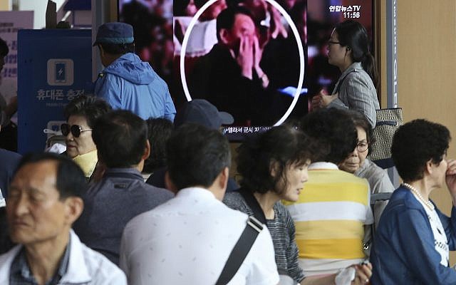 People watch a TV screen showing an image of senior North Korean official Kim Yong Chol in a musical performance by the wives of Korean People's Army officers in North Korea, during a news program at the Seoul Railway Station in Seoul, South Korea on June 3, 2019. (AP Photo/Ahn Young-joon) People watch a TV screen showing an image of senior North Korean official Kim Yong Chol in a musical performance by the wives of Korean People's Army officers in North Korea, during a news program at the Seoul Railway Station in Seoul, South Korea on June 3, 2019. (AP Photo/Ahn Young-joon)