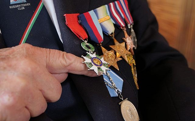 D-Day veteran Donald Hitchcock poses for a photo wearing his campaign medals aboard the MV Boudicca ship as veterans return to the scene of the D-Day landings 75 years after the Allied invasion of northern France, Tuesday June 4, 2019. Hitchcock is desperate to spend D-Day commemoration on Omaha Beach with the Americans he served alongside all those years ago. Many veterans are returning to the scene where as young men they stormed the beaches of Normandy in northern France during World War II, with the fate of the free world resting on their shoulders. (AP Photo/Ben Jary)