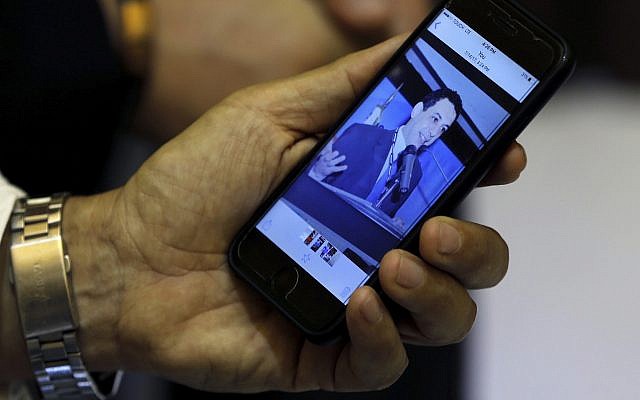 Ziad Zakka, brother of Nizar Zakka who is imprisoned in Iran, shows a photo of his brother on his cellular telephone in Beirut, Lebanon, July 18, 2017. (AP/Bilal Hussein) Ziad Zakka, brother of Nizar Zakka who is imprisoned in Iran, shows a photo of his brother on his cellular telephone in Beirut, Lebanon, July 18, 2017. (AP/Bilal Hussein)