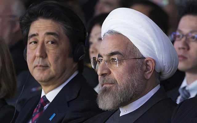 Illustrative: In this Jan. 22, 2014 file photo, Japanese Prime Minister Shinzo Abe, left, and Iranian President Hassan Rouhani, attend a session of the World Economic Forum in Davos, Switzerland. (AP Photo/Michel Euler, File) Illustrative: In this Jan. 22, 2014 file photo, Japanese Prime Minister Shinzo Abe, left, and Iranian President Hassan Rouhani, attend a session of the World Economic Forum in Davos, Switzerland. (AP Photo/Michel Euler, File)