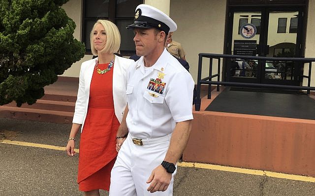 Navy Special Operations Chief Edward Gallagher leaves a military courtroom on Naval Base San Diego with his wife, Andrea Gallagher, in San Diego, May 30, 2019. (Julie Watson/AP) Navy Special Operations Chief Edward Gallagher leaves a military courtroom on Naval Base San Diego with his wife, Andrea Gallagher, in San Diego, May 30, 2019. (Julie Watson/AP)