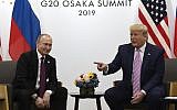 US President Donald Trump, right, meets with Russian President Vladimir Putin during a bilateral meeting on the sidelines of the G-20 summit in Osaka, Japan, June 28, 2019. (AP Photo/Susan Walsh)