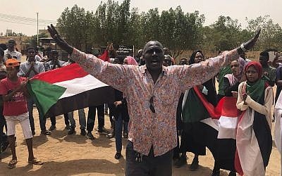 A Sudanese protester shouts slogans during a demonstration against the military council, in Khartoum, Sudan, on June 30, 2019. (AP Photo/Hussein Malla)