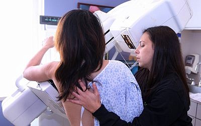 Illustrative: A woman undergoes a digital mammogram (Bizuayehu Tesfaye/AP Images for College of American Pathologists)