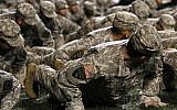 Illustrative -- Members of the UAB and Samford ROTC programs perform pushups on the sideline for every touchdown scored in honor of Veterans Day during an NCAA college football game between UAB and East Carolina on Nov. 11, 2010, in Birmingham, Alabama (AP Photo/Butch Dill)
