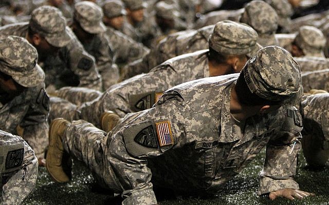 Illustrative -- Members of the UAB and Samford ROTC programs perform pushups on the sideline for every touchdown scored in honor of Veterans Day during an NCAA college football game between UAB and East Carolina on Nov. 11, 2010, in Birmingham, Alabama (AP Photo/Butch Dill) Illustrative -- Members of the UAB and Samford ROTC programs perform pushups on the sideline for every touchdown scored in honor of Veterans Day during an NCAA college football game between UAB and East Carolina on Nov. 11, 2010, in Birmingham, Alabama (AP Photo/Butch Dill)