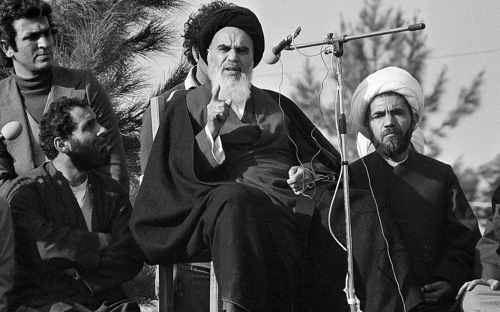Ayatollah Khomeini speaks to followers at Behesht Zahra Cemetery after his arrival in Tehran, Iran, ending 14 years of exile, February 1 1979. (AP Photo/FY)