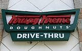 This photo from August 11, 2017, shows a Krispy Kreme Doughnuts sign in Miami. (AP Photo/Alan Diaz)