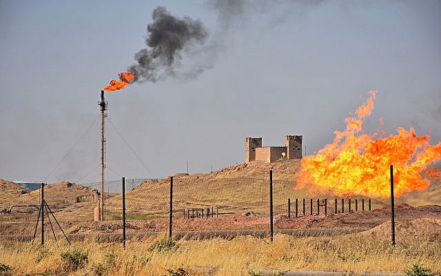 Fires flare off from gas in Kirkuk, Iraq, October 18, 2017. (AP Photo/Emad Matti) Fires flare off from gas in Kirkuk, Iraq, October 18, 2017. (AP Photo/Emad Matti)