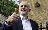 Jeremy Corbyn leader of Britain's opposition Labour Party gives the thumbs up after voting in the European Elections in London, Thursday, May 23, 2019. (AP Photo/Kirsty Wigglesworth)