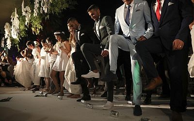 Gay couples take part in a mass same-sex wedding in Tel Aviv, Israel, June 4, 2019 to demand the right to same-sex marriage ahead of the country's Gay Pride week. (AP /Oded Balilty)
