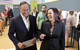 In this file photo from November 8, 2016, Kamala Harris, right, votes with her husband, Douglas Emhoff in Los Angeles. (AP Photo/Nick Ut, File)