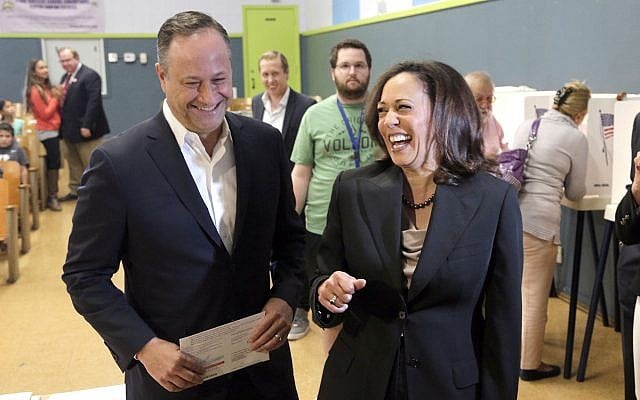 In this file photo from November 8, 2016, Kamala Harris, right, votes with her husband, Douglas Emhoff in Los Angeles. (AP Photo/Nick Ut, File) In this file photo from November 8, 2016, Kamala Harris, right, votes with her husband, Douglas Emhoff in Los Angeles. (AP Photo/Nick Ut, File)