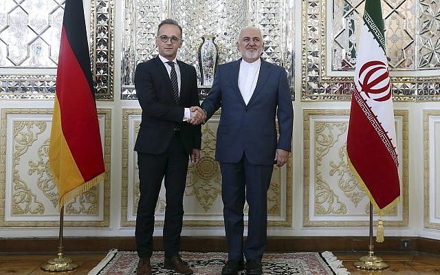 Iranian Foreign Minister Mohammad Javad Zarif, right, and his German counterpart Heiko Maas shake hands for the media prior to their meeting, in Tehran, Iran, June 10, 2019. (Ebrahim Noroozi/AP) Iranian Foreign Minister Mohammad Javad Zarif, right, and his German counterpart Heiko Maas shake hands for the media prior to their meeting, in Tehran, Iran, June 10, 2019. (Ebrahim Noroozi/AP)