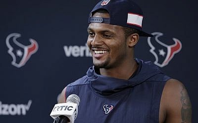 Houston Texans quarterback Deshaun Watson answers questions during a press conference after a practice at the team's NFL football training facility in Houston Tuesday, June 11, 2019. (AP Photo/Michael Wyke)