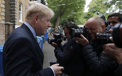 British Conservative Party lawmaker Boris Johnson leaves his home in London, June 13, 2019. (AP /Frank Augstein)