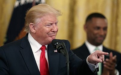US President Donald Trump gestures into the audience as he speaks  in the East Room of the White House, Thursday June 13, 2019, in Washington. (AP Photo/Jacquelyn Martin)