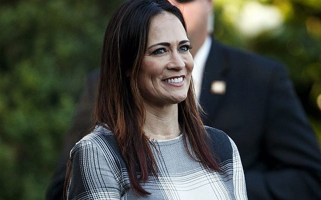 In this June 21, 2019 photo, Stephanie Grisham, spokeswoman for first lady Melania Trump, watches as President Donald Trump and the first lady greet attendees during the annual Congressional Picnic on the South Lawn in Washington. First lady Melania Trump has announced that Grisham will be the new White House press secretary. Grisham, who has been with President Donald Trump since 2015, will also take on the role of White House communications director. (AP Photo/Jacquelyn Martin) In this June 21, 2019 photo, Stephanie Grisham, spokeswoman for first lady Melania Trump, watches as President Donald Trump and the first lady greet attendees during the annual Congressional Picnic on the South Lawn in Washington. First lady Melania Trump has announced that Grisham will be the new White House press secretary. Grisham, who has been with President Donald Trump since 2015, will also take on the role of White House communications director. (AP Photo/Jacquelyn Martin)