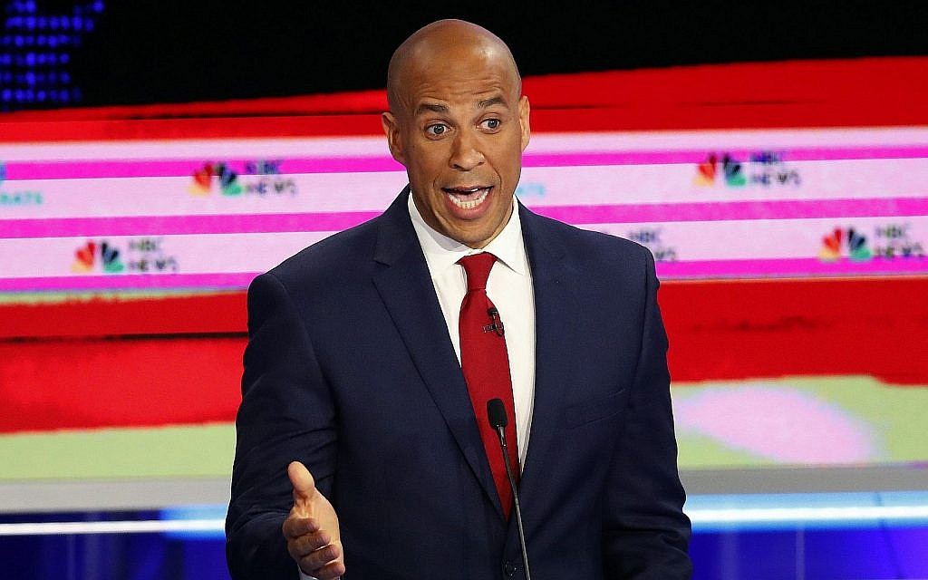 Democratic presidential candidate Sen. Cory Booker, D-N.J., speaks at a Democratic primary debate hosted by NBC News at the Adrienne Arsht Center for the Performing Art, Wednesday, June 26, 2019, in Miami. (AP Photo/Wilfredo Lee) Democratic presidential candidate Sen. Cory Booker, D-N.J., speaks at a Democratic primary debate hosted by NBC News at the Adrienne Arsht Center for the Performing Art, Wednesday, June 26, 2019, in Miami. (AP Photo/Wilfredo Lee)