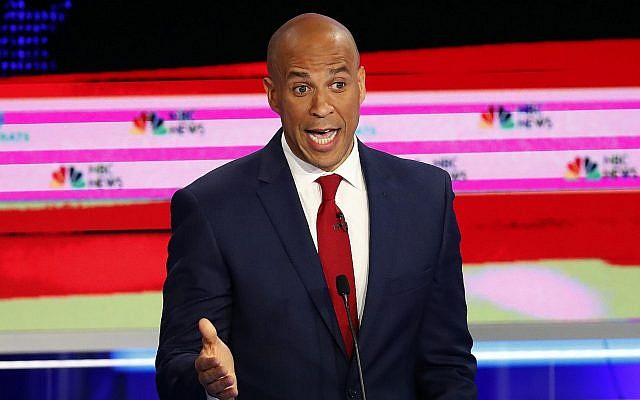 Democratic presidential candidate Sen. Cory Booker, D-N.J., speaks at a Democratic primary debate hosted by NBC News at the Adrienne Arsht Center for the Performing Art, Wednesday, June 26, 2019, in Miami. (AP Photo/Wilfredo Lee) Democratic presidential candidate Sen. Cory Booker, D-N.J., speaks at a Democratic primary debate hosted by NBC News at the Adrienne Arsht Center for the Performing Art, Wednesday, June 26, 2019, in Miami. (AP Photo/Wilfredo Lee)
