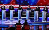 Democratic presidential candidates former US vice president Joe Biden, Independent Senator Bernie Sanders of Vermont, California Senator Kamala Harris, New York Senator Kirsten Gillibrand, former Colorado senator Michael Bennet, and California Representative Eric Swalwell, attend during the Democratic primary debate hosted by NBC News at the Adrienne Arsht Center for the Performing Arts, June 27, 2019, in Miami. (AP Photo/Wilfredo Lee)
