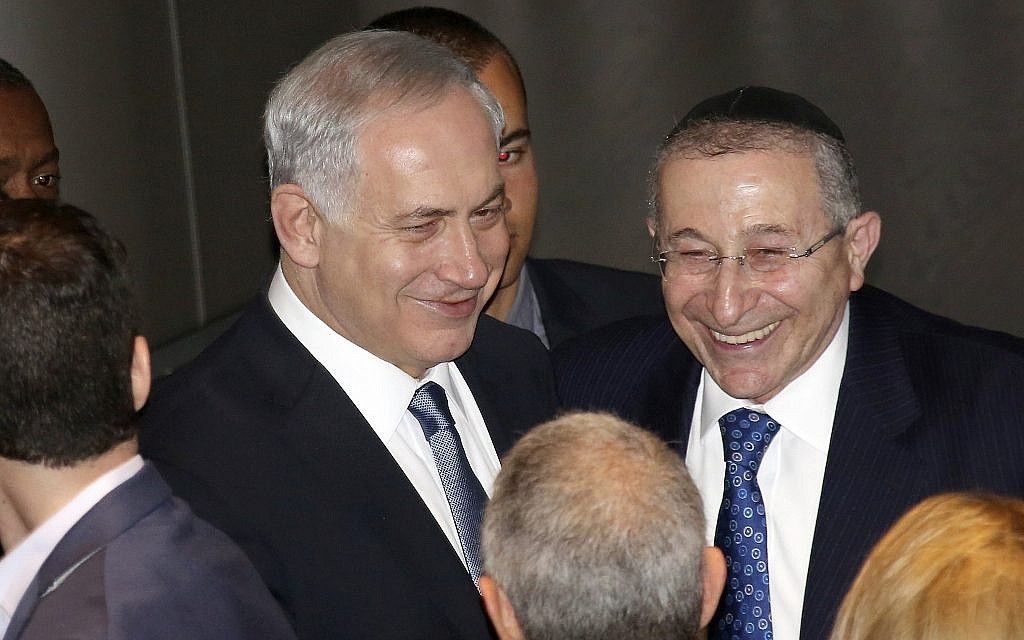 Israeli Prime Minister Benjamin Netanyahu, left, and Wiesenthal Center founder and dean Rabbi Marvin Hier greet leaders in Los Angeles's Jewish community at the Simon Wiesenthal Center's Museum of Tolerance, Thursday, March 6, 2014, in Los Angeles.  (AP Photo/Nick Ut)