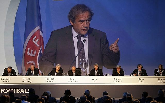 Former UEFA President Michel Platini is seen on a giant screen as he delivers a speech at a UEFA meeting in Athens, on September 14, 2016. (AP/Thanassis Stavrakis) Former UEFA President Michel Platini is seen on a giant screen as he delivers a speech at a UEFA meeting in Athens, on September 14, 2016. (AP/Thanassis Stavrakis)
