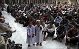 Illustrative - Muslims attend the Friday noon prayer at Al-Azhar mosque in Cairo, Egypt, December 28, 2012. (AP/Khalil Hamra)