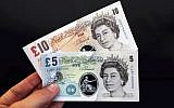 Illustrative photo of British banknotes during a news conference at the Bank of England in London, September 10, 2013. (Chris Ratcliffe/AP)