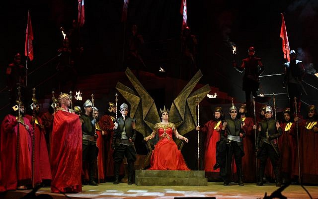 Queen Abigaille assumes the throne as part of Verdi's Nabucco opera, performed at Jerusalem's Sultan's Pool venue on June 20, 2019. (Eithan Elkin) Queen Abigaille assumes the throne as part of Verdi's Nabucco opera, performed at Jerusalem's Sultan's Pool venue on June 20, 2019. (Eithan Elkin)