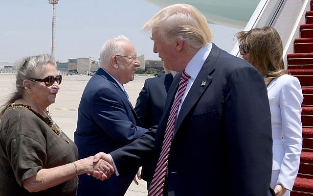US President Donald Trump (R) shakes hands with President Reuven Rivlin's wife Nechama as he arrives at Ben Gurion Airport on May 22, 2017, for his first official visit to Israel since becoming US president. (Avi Ohayon/GPO) US President Donald Trump (R) shakes hands with President Reuven Rivlin's wife Nechama as he arrives at Ben Gurion Airport on May 22, 2017, for his first official visit to Israel since becoming US president. (Avi Ohayon/GPO)