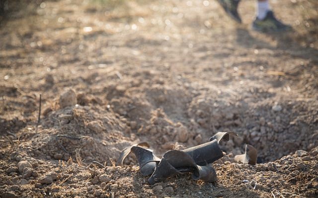 Illustrative: The remains of a rocket fired from Gaza that fell near an Israeli community in July 2018 (Hadas Parush/Flash90) Illustrative: The remains of a rocket fired from Gaza that fell near an Israeli community in July 2018 (Hadas Parush/Flash90)