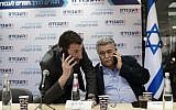 Labor MKs Itzik Shmuli (L) and Amir Peretz  at the party's headquarters in Tel Aviv on February 13, 2019. (Tomer Neuberg/Flash90)