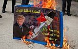 Palestinians protest against US President Donald Trump's so-called Deal of the Century, in the West Bank city of Hebron, February 22, 2019. (Wisam Hashlamoun/Flash90)