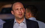 Naftali Bennett gives a statement to the media, outside his home in Ra'anana, June 2, 2019, hours after being fired as education minister. (Flash90)