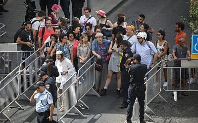 Security checks at an entrance to the Gay Pride Parade in Jerusalem, on June 6, 2019. (Noam Revkin Fenton/Flash90)