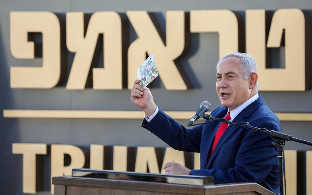 Prime Minister Benjamin Netanyahu speaks at the ceremony for a new town named for US President Donald Trump, in Kela Alon in the northwestern Golan, on June 16, 2019. (David Cohen/Flash90)