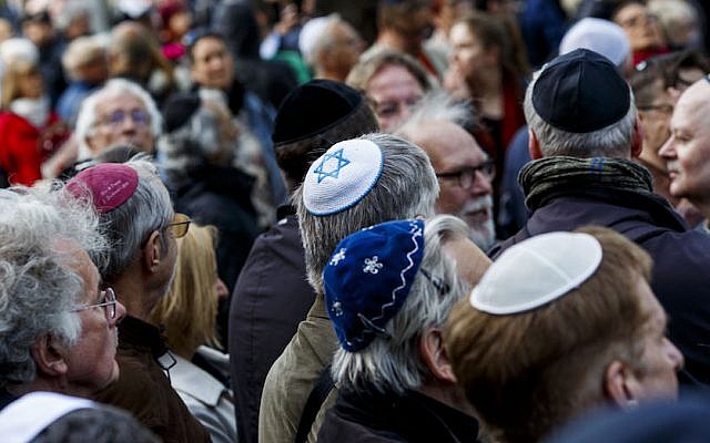 Participants wearing kippas at a rally in Berlin, April 25, 2018. (Carsten Koall/Getty Images via JTA) Participants wearing kippas at a rally in Berlin, April 25, 2018. (Carsten Koall/Getty Images via JTA)