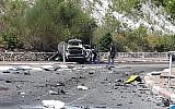 The scene of a car explosion in a suspected underworld hit in Nesher, June 3, 2019. (Israel Police)