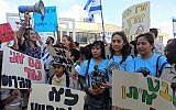 Women with the Filipino community group United Children of Israel, which helped organize the protest against deportations, in Tel Aviv on June 24, 2019. (Melanie Lidman/Times of Israel)