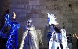 Fairytale, lit-up characters who greet visitors at Jaffa Gate, during Jerusalem's Festival of Light, which opened June 26, 2019 (Jessica Steinberg/Times of Israel)