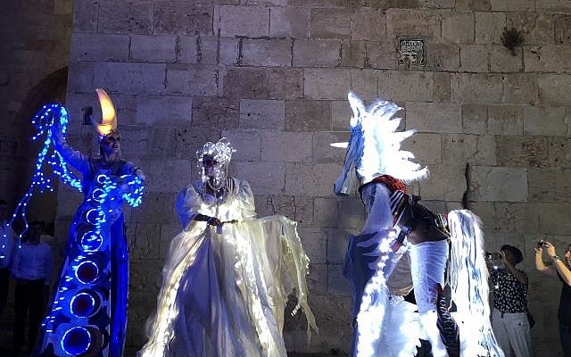 Fairytale, lit-up characters who greet visitors at Jaffa Gate, during Jerusalem's Festival of Light, which opened June 26, 2019 (Jessica Steinberg/Times of Israel) Fairytale, lit-up characters who greet visitors at Jaffa Gate, during Jerusalem's Festival of Light, which opened June 26, 2019 (Jessica Steinberg/Times of Israel)