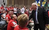 President Reuven RIvlin with participants in Veterans Games in Jerusalem, May 30, 2019 (Mark Nriman/GPO)