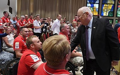 President Reuven RIvlin with participants in Veterans Games in Jerusalem, May 30, 2019 (Mark Nriman/GPO) President Reuven RIvlin with participants in Veterans Games in Jerusalem, May 30, 2019 (Mark Nriman/GPO)