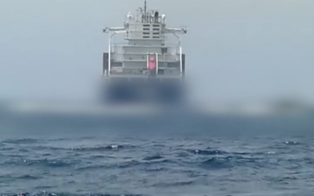 Cargo ship off the coast of Haifa where a fire was started on board by 'unidentified elements' on June 9, 2019. (Screen capture/Israel Police)